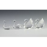 Two Swarovski Crystal figures of swans 9cm, ditto 7cm and another 6.5cm