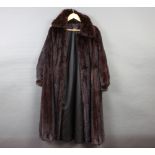 A lady's full length mink coat by Charles Moss Some molting in places