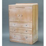 Browman Brothers Ltd., an Art Deco limed oak tallboy with raised back, fitted a shallow drawer above