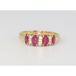 An 18ct yellow gold ruby and diamond ring, 3.7 grams, size P