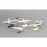 A model of a British Airways Concorde 25cm x 11cm, 10 other airplane models of airplanes including