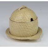 A Wedgwood creamware honey pot and cover in the form of a beehive 11cm