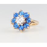 A 9ct yellow gold paste set daisy ring 3.4 grams, size I