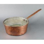 A copper saucepan marked SG 13cm h x 30cm diam.