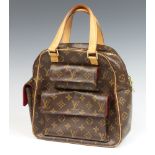 Louis Vuitton, a lady's Monogram Canvas Excentri-cite bag with 2 external pockets to the front and 1
