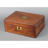 A Victorian rectangular mahogany writing slope with hinged lid and rectangular plaque to the top