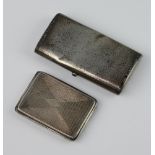 A Continental 800 hammer pattern cigarette case together with a silver engine turned match sleeve