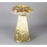 A well weathered staddle stone of mushroom form the base 70cm h x 41cm w x 36cm d, diameter of