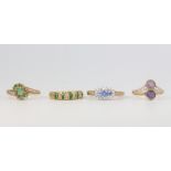 Four 9ct yellow gold gem set rings size J, K, N and Q, 7.7 grams