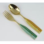 A Michelsen, a silver gilt enamelled fork and spoon, dated 1960, 94 grams