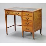 An Edwardian inlaid mahogany desk with green inset writing surface, fitted 5 drawers with gilt