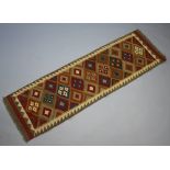 A black and tan ground Maimana Kilim runner 198cm x 62cm