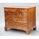 A Georgian bleached mahogany chest of 2 short and 3 long drawers with brass swan neck drop