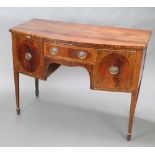 A Georgian inlaid mahogany bow front sideboard fitted a drawer flanked by cupboard and 1 short