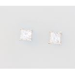 A pair of 14ct white gold princess cut diamond ear studs 1ct, 1 gram