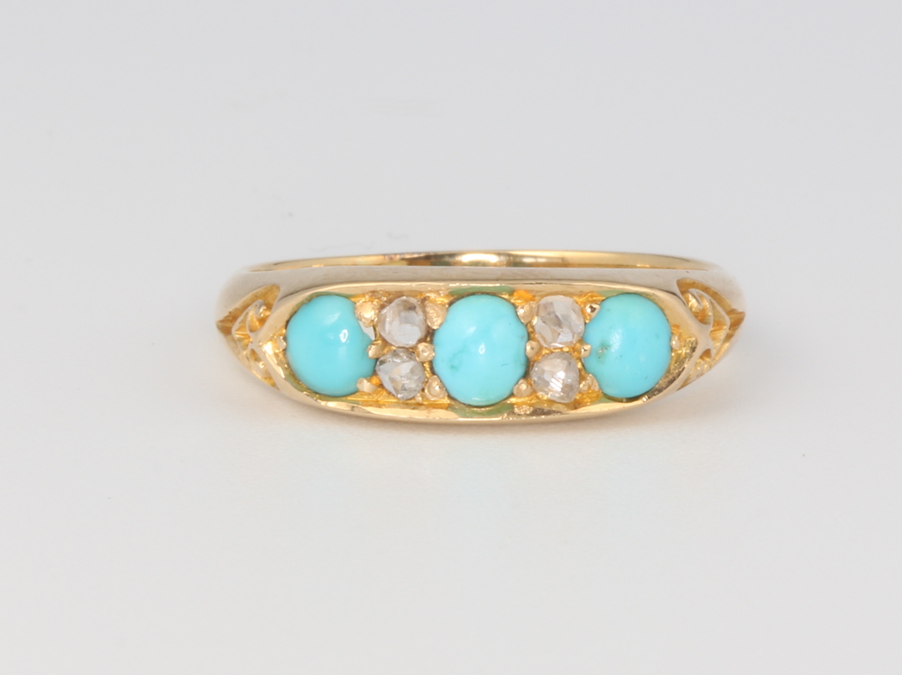 A Victorian yellow metal turquoise and diamond ring, 3.4 grams, size M 1/2