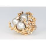 A vintage yellow metal grey baroque pearl and diamond ring, diamonds 0.5ct, 17.3 grams, size N