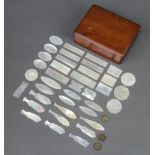 38 various carved mother of pearl game counters comprising 3 circular, 10 oval, 9 in the form of