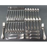 Seventeen silver plated lily pattern dinner forks, 12 others, 12 dessert forks and 12 dessert