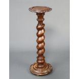A Victorian beech and oak circular torchere raised on a spiral turned column 97cm h x 33cm w Some