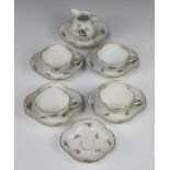 A 20th Century Meissen tea set comprising cream jug, 4 quatrefoil tea cups (1 chipped) together with