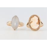 An 18ct yellow gold cameo ring size L, 2.49 grams and a yellow metal moonstone ring size N 1/2 4.3