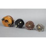 A Milward wooden and brass 5" star back centre pin fishing reel with offset check half wood and
