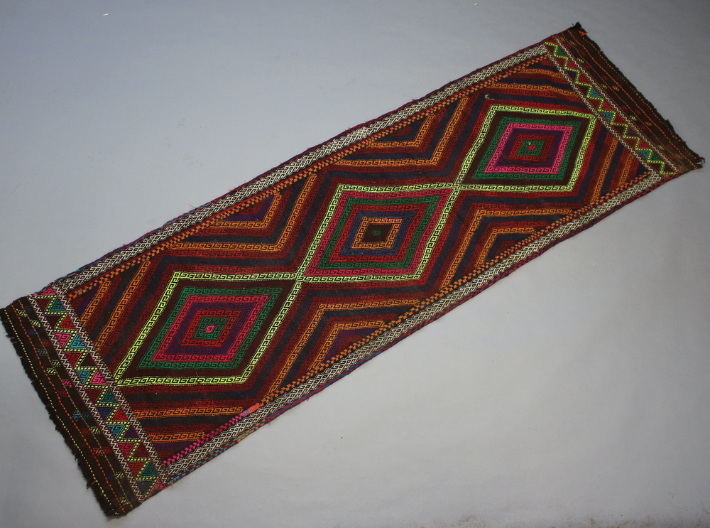 A red blue and green ground Suzni Kilim runner 250cm x 79cm