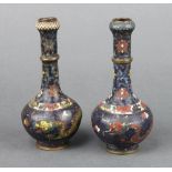 A pair of Japanese black ground cloisonne enamel club shaped vases decorated dragons, the base