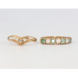Two 9ct yellow gold gem set rings, size K and O, 2.6 grams