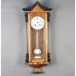 A Victorian Vienna style regulator with 12cm enamelled dial Roman numerals and gridiron pendulum,