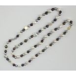 A string of baroque and 3 colour cultured pearls 96cm