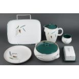 A Denby Greenwheat dinner service comprising 5 rectangular dishes, 2 section vegetable dish, an oval