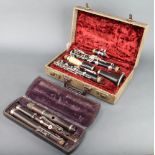 A clarinet, the bowl marked F Buisson Bule, sole distributor Dallas London, cased, a Monzani & Co. 3