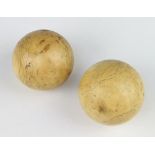 Two Victorian turned ivory billiard balls