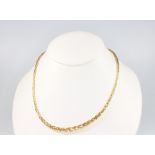A 14ct yellow gold fancy link necklace 43cm, 8 grams