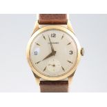 A gentleman's Garrard 9ct yellow gold wristwatch with seconds at 6 o'clock, contained in a 30mm case