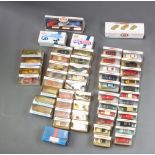 A collection of 51 boxed Dinky model cars to include "Classic Sports Cars" Series 1 and "Classic