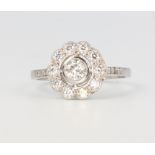A platinum diamond cluster ring, 0.75ct, 4.7 grams, size O 1/2