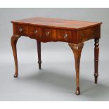 A Georgian style mahogany side table fitted 2 drawers with ring drop handles, raised on cabriole