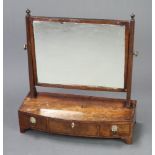 A 19th Century rectangular plate dressing table mirror contained in a mahogany swing frame, the