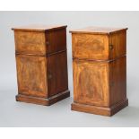 A pair of 19th Century inlaid mahogany and cross banded pedestal cabinets fitted double cupboards