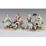 A pair of modern Sitzendorf porcelain groups of a bird seller and flower girl and a shepherd and