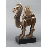 Frank Meisler Israel, a limited edition gilt metal figure of a standing camel, raised on a wooden