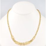 A 14ct yellow gold fancy link necklace 45cm, 5 grams