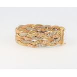 An 18ct 3 colour gold woven milanese bracelet 46 grams, 19.5cm