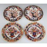 A pair of Royal Crown Derby Imari pattern plates decorated with flowers 22cm, a pair of ditto