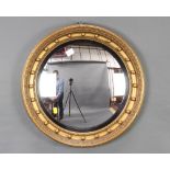 A Georgian style circular convex plate wall mirror contained in a ball studded frame 50cm diam.