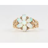 A 9ct yellow gold opal cluster ring, 2.2 grams, size M