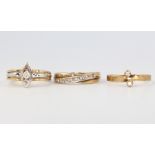 Three 9ct yellow gold gem set rings 6.5 grams, size J, L and M